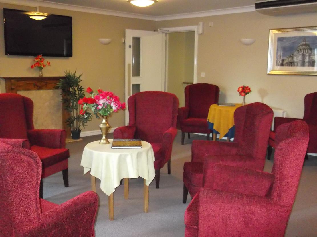 lounge with red armchairs